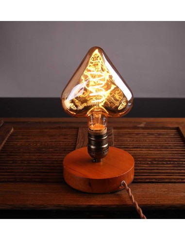 Пример свечения светодиодной филаментной лампы HEART Vintage E27 3W 2200K